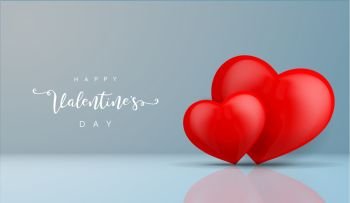 Two red hearts on blue background with reflection and shadow for valentines day background. 