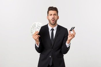 Surprised, speechless and impressed handsome caucasian businessman in classic suit showing credit card, say wow, standing white background astonished.. Surprised, speechless and impressed handsome caucasian businessman in classic suit showing credit card, say wow, standing white background astonished