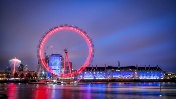 London eye in motion at blue hour in London