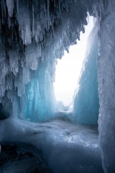 An ice cave beckons on Lake Baikal, the world’s oldest and deepest freshwater lake, located in Siberia. 