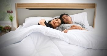 Young loving couple in the bed and Romantic couple in love on bedtime and happiness concept
