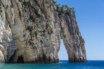 panoramic view of reefs and their formations with variations in the color of the water as it approaches the rocks on the shores of the island of zakynthos