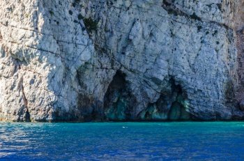 Reflections of the sea on the walls of caves on the shores of the island of Zakynthos in the Ionian Sea