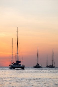 silhouette of sail boat on sea at sunset ,phuket,thailand