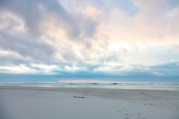 Dramatic sky at sunset on Noordhoek Beach in Cape Town South Africa
