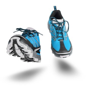Running blue sport shoes seen front, isolated on white background