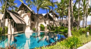 luxury 5 star resort territory with swimming pool and hotel rooms - Constance Belle Mare Plage. Mauritius island. Pointe de flacq , Belle Mare. February 2020. Mauritius island holidays. Exotic hotel with beautiful territory