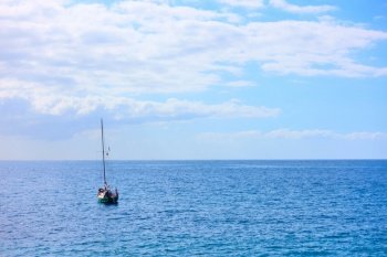 Yacht in the sea on the summer day - seascape