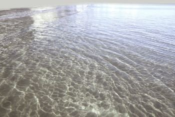 Clear transparent beach water shore in Costa Blanca of alicante