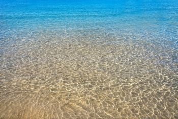 Clear beach water sand in Costa Blanca of Alicante at Spain Mediterranean