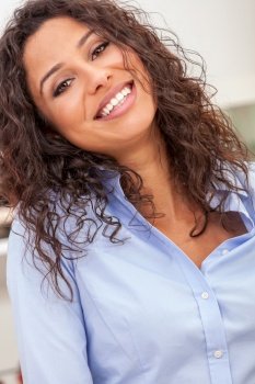 Portrait of a beautiful Latina Hispanic girl young woman smiling with perfect teeth