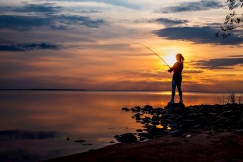 Woman fishing on Fishing rod spinning in Finland