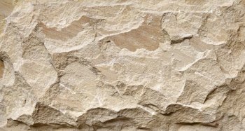 
Beige natural stone grunge background, rock wall with rough texture
