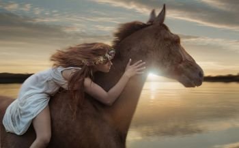 Conceptual photo of galloping horse with a horsewoman