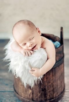 Portrait of a cute sleeping newborn tot