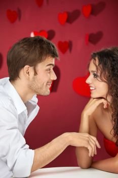 Conversation of two flirting enamoured on a red background