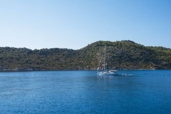 yacht on bay and castle in Kekova, near ruins of the ancient city on the Kekova island, Turkey. yacht on bay