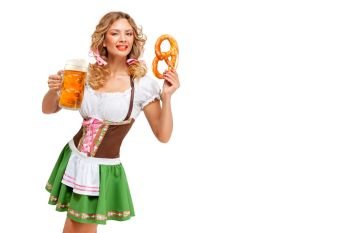 Creative concept photo of Oktoberfest waitress wearing a traditional Bavarian costume with beer and pretzel isolated on white background.
