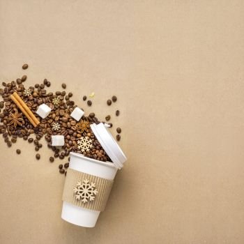 Creative concept photo of take away coffee cup on brown background.
