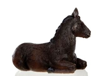 Figure of a mule for the Nativity Potal isolated on a white background