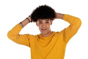 Surprised teenager boy with yellow t-shirt isolated on a white background
