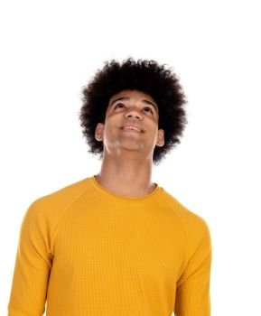 Pensive teenager boy wiht yellow t-shirt isolate on a white background