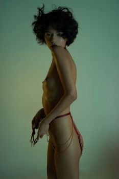 Fashion art photo of beautiful sensual woman in provocative lingerie. Sexy stripper in designer underwear