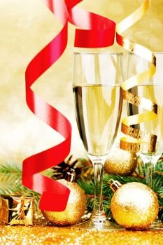 Glasses of champagne and decoration with natural fir branch