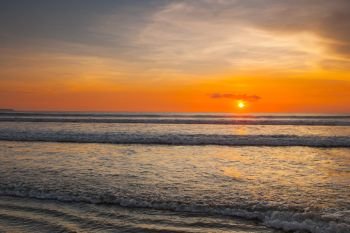 Amazing colorful sunset over sea form Bali beach. Amazing sunset form Bali beach