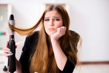 Young woman having a bad hair day