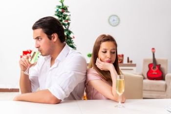 Young pair conflicting at christmas night