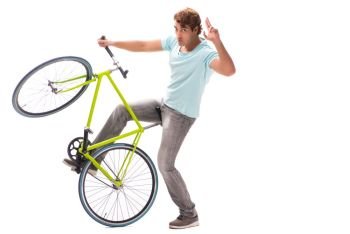 Young man riding a bicycle isolated on white background