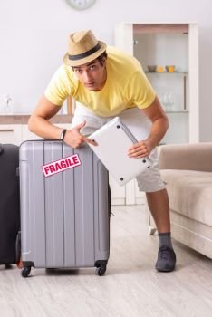 Man going on vacation with fragile suitcases