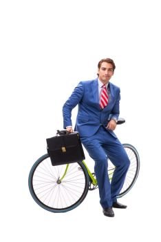 Young businessman using bike to commute to the office. The young businessman using bike to commute to the office