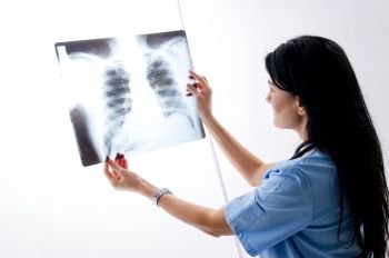 Female doctor radiologist working in the clinic 
