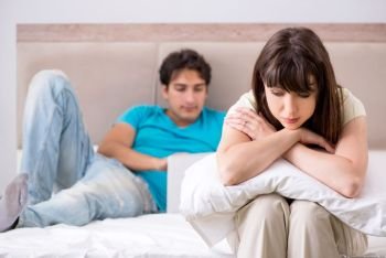 Woman feeling lonely with husband