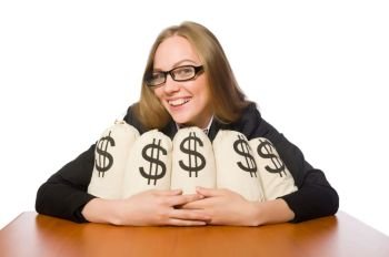 Female employee with money sacks on her table 