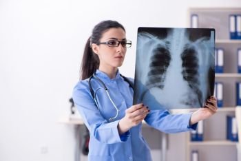 Young female doctor radiologist working in the clinic 