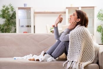 Sick middle-aged woman suffering at home 