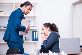 Two employees suffering at workplace 