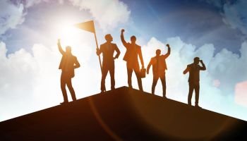 Businessmen in achievement and teamwork concept