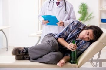 Young male alcoholic visiting old doctor  