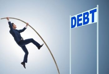 The businessman pole vaulting over debt in business concept. Businessman pole vaulting over debt in business concept