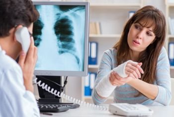 The young woman visiting radiologist for x-ray exam. Young woman visiting radiologist for x-ray exam
