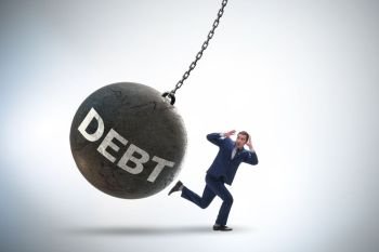 The businessman in debt and loan concept. Businessman in debt and loan concept