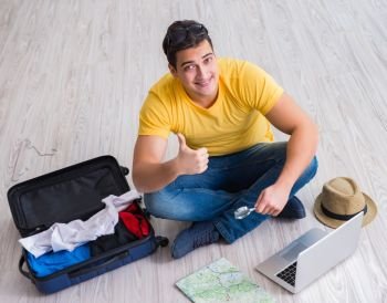 The man planning his vacation trip with map. Man planning his vacation trip with map