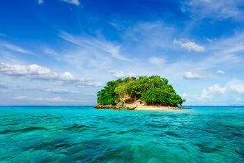 Vacation holidays concept background - tropical island and long-tail boat in sea. Thailand. Tropical island in sea