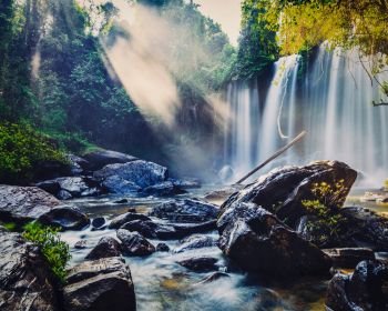 Vintage retro effect filtered hipster style image of tropical waterfall Phnom Kulen, Cambodia. Tropical waterfall in Cambodia