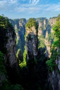 Famous tourist attraction of China - Avatar Hallelujah Mountain in Zhangjiajie stone pillars cliff mountains on sunset at Wulingyuan, Hunan, China. Zhangjiajie mountains, China