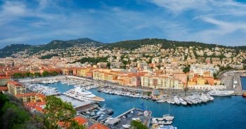 Panorama of Old Port of Nice with luxury yacht boats from Castle Hill, France, Villefranche-sur-Mer, Nice, Cote d’Azur, French Riviera. Panorama of Old Port of Nice with yachts, France